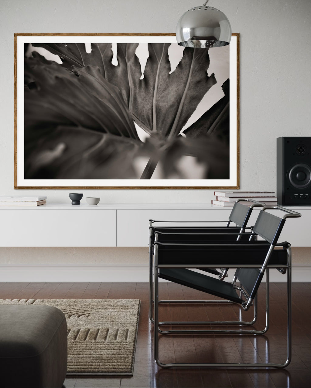 Modern interior featuring a framed artwork of a large leaf by Francoise V Fine Art Gallery in Cape Town, South Africa