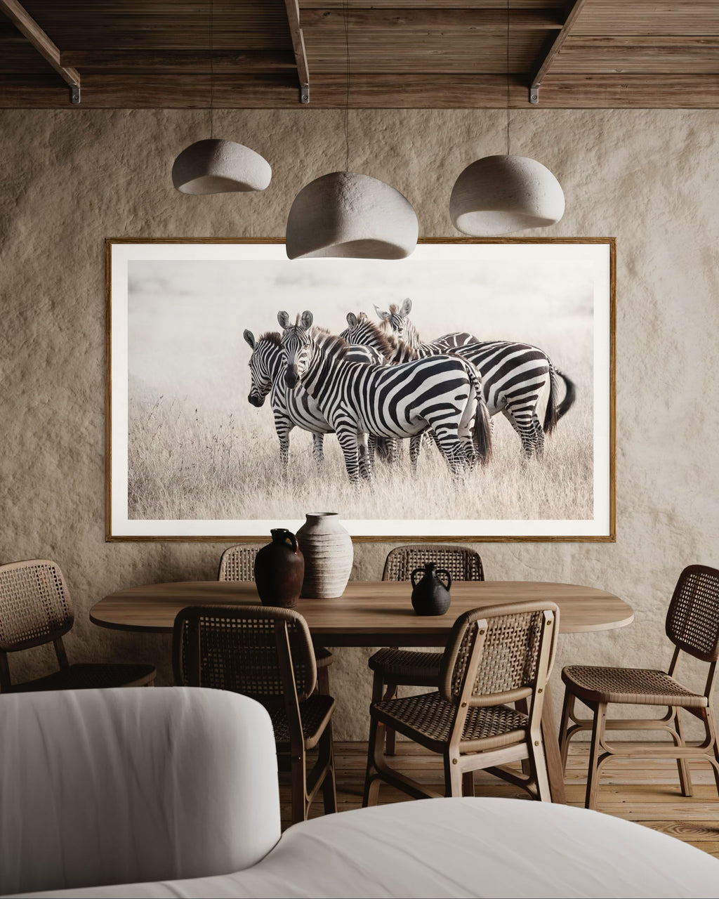 Modern interior featuring a framed artwork of a portrait of a herd of zebras by Francoise V Fine Art Gallery in Cape Town, South Africa