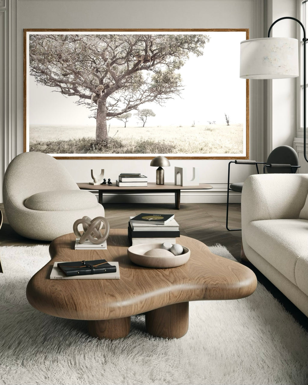 Modern interior featuring a framed artwork of a portrait of a pride of lions in a tree by Francoise V Fine Art Gallery in Cape Town, South Africa.