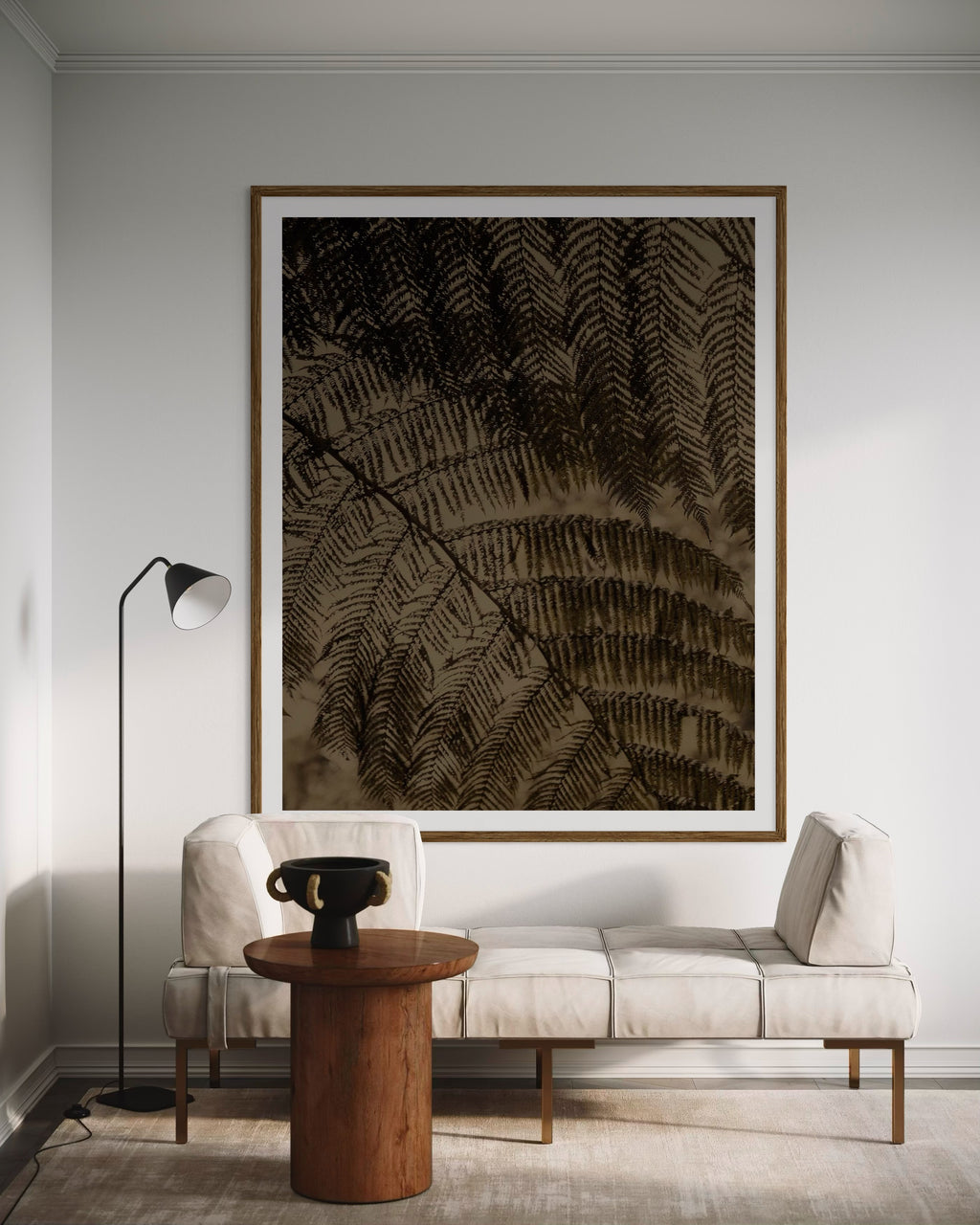 Modern living room with a large framed earthy abstract artwork of close-up of ferns by Francoise V Fine Art Gallery in Cape Town, South Africa.