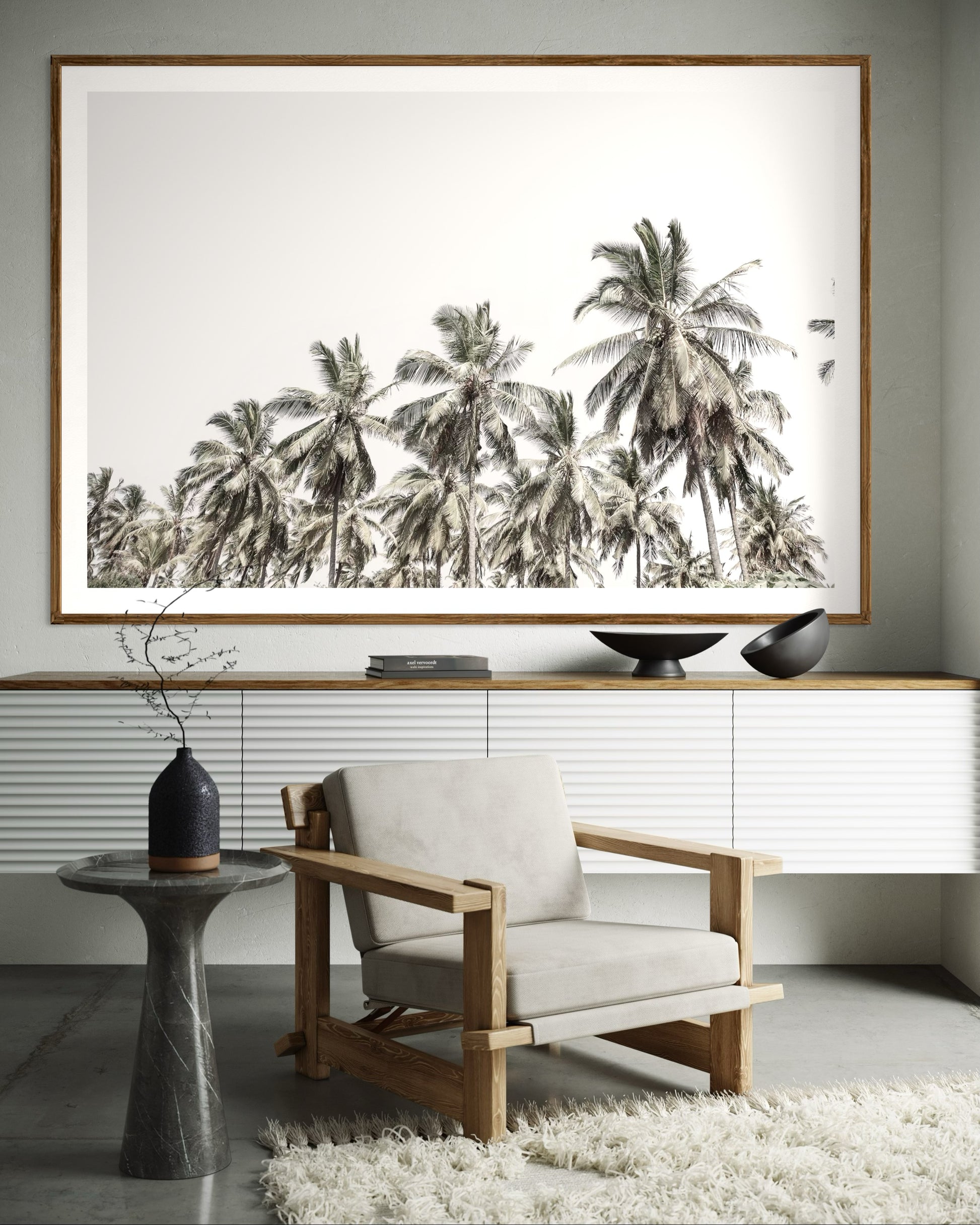 Modern interior featuring a framed artwork of palm trees with a clear sky by Francoise V Fine Art Gallery in Cape Town, South Africa