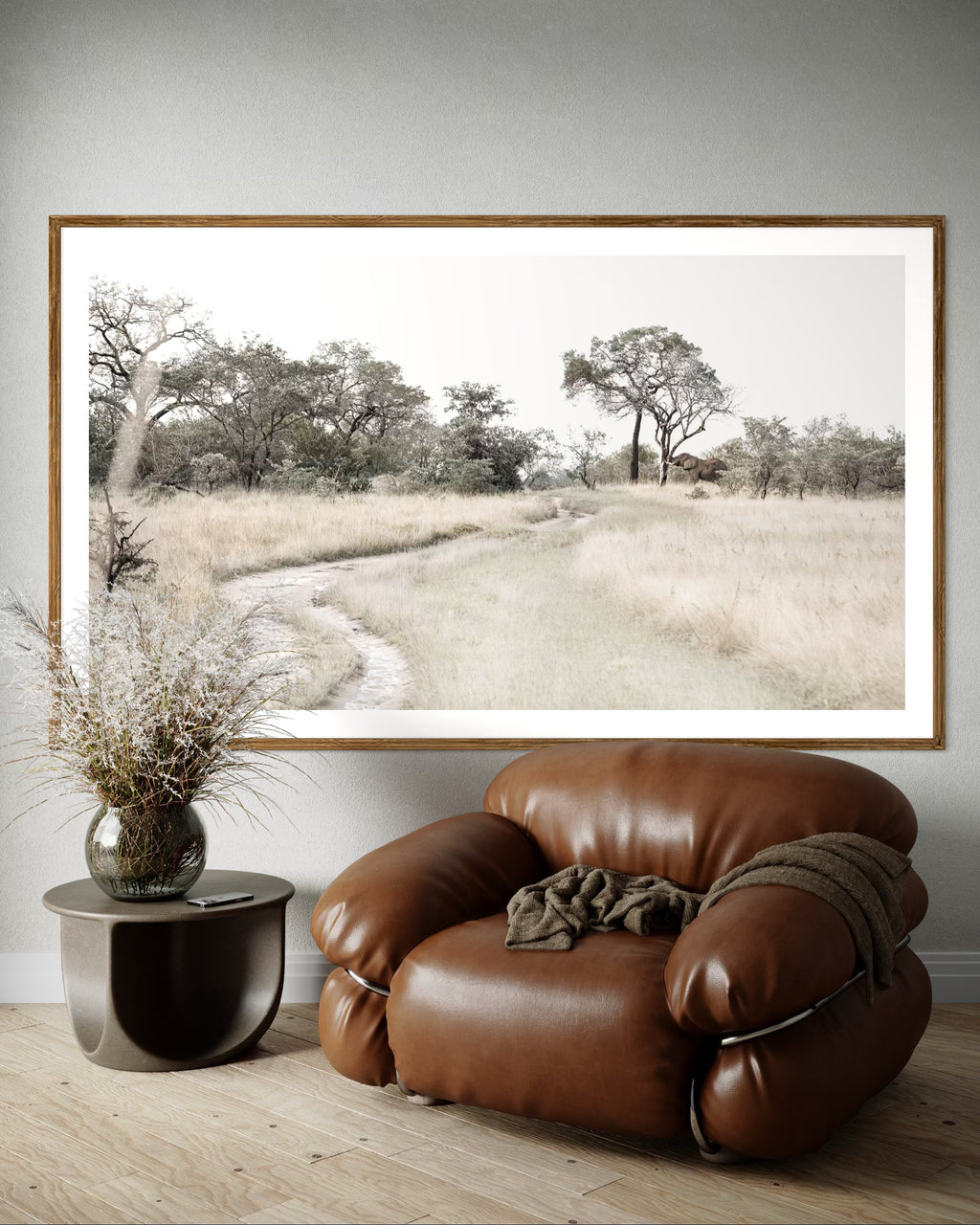 Modern interior featuring a framed artwork of a portrait of a savannah landscape by Francoise V Fine Art Gallery in Cape Town, South Africa