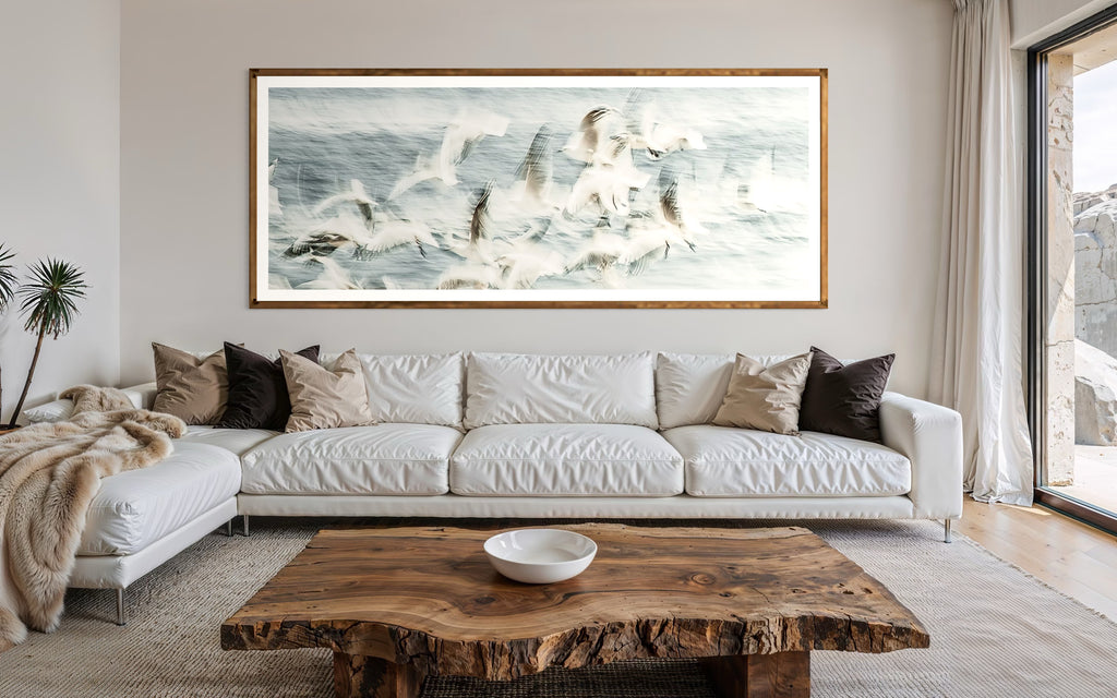 Modern interior featuring a framed artwork of Flock of birds flying over a snowy landscape by Francoise V Fine Art Gallery in Cape Town, South Africa