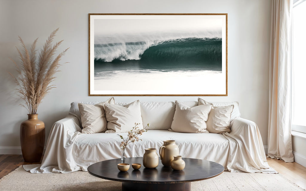 Modern interior featuring a photo of a Wave crashing in the ocean with a cloudy sky by Francoise V Fine Art Gallery in Cape Town, South Africa