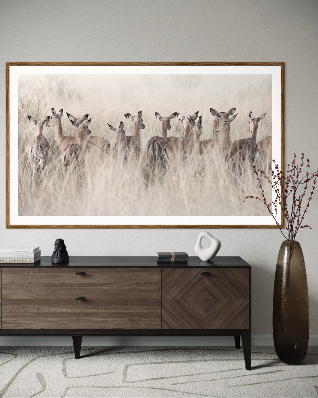Modern interior featuring a framed artwork of a portrait of a herd Springbok in tall grass by Francoise V Fine Art Gallery in Cape Town, South Africa